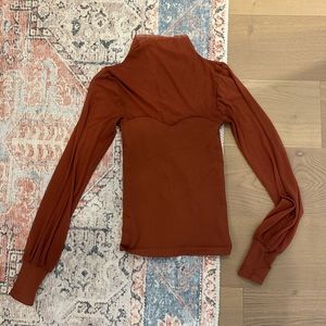 Free people light up layering top in terracotta